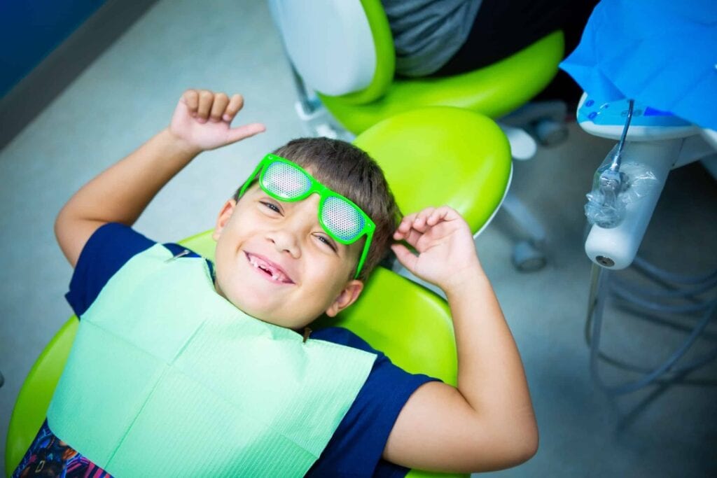 boy-with-glasses-at-dentist